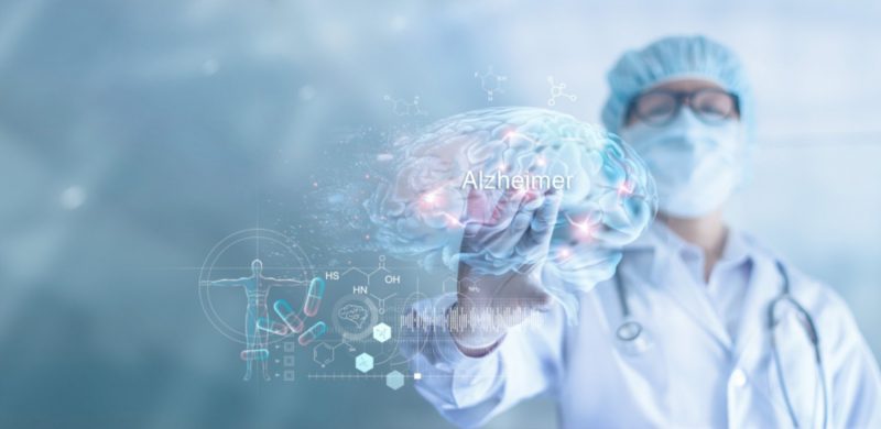 A doctor touching a digital brain