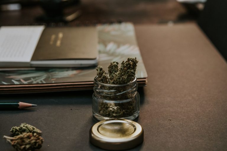 glass-jar-marijuana-notebooks-pencil