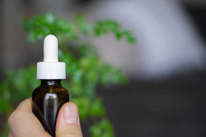 Man holding medical marijuana product