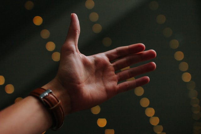 An open hand and fingertips