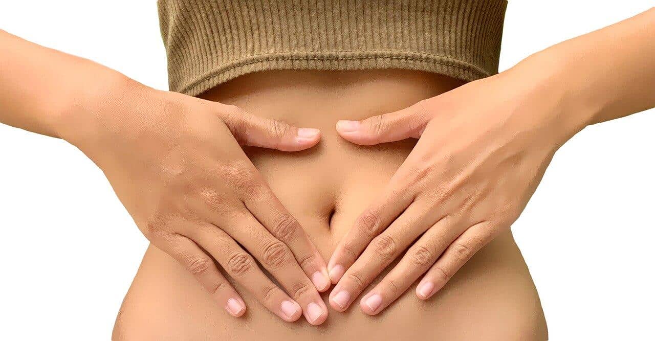 Woman experiencing stomach pain