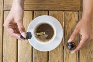 Adding cannabis oil to coffee