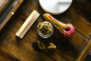 Cannabis buds on a wooden table