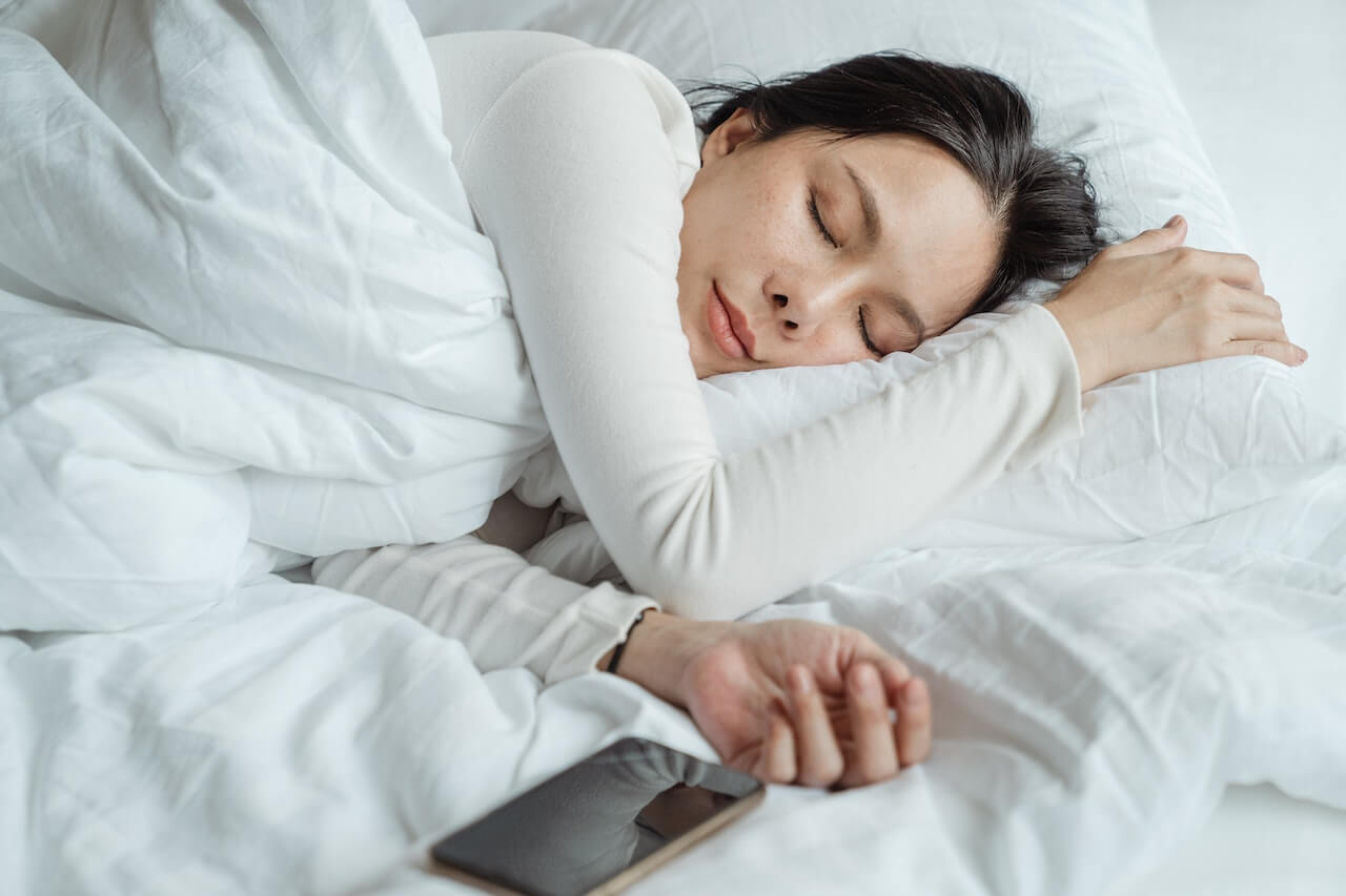 Woman sleeping in bed