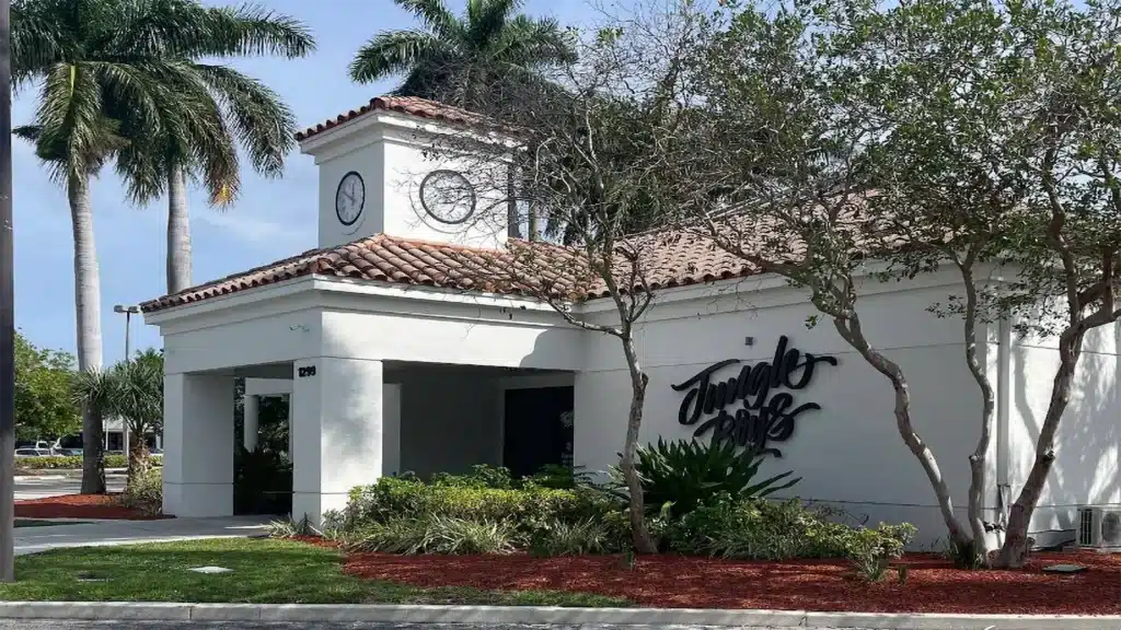 Jungle Boys Deerfield Beach medical marijuana dispensary in Florida exterior with palm trees and storefront entrance